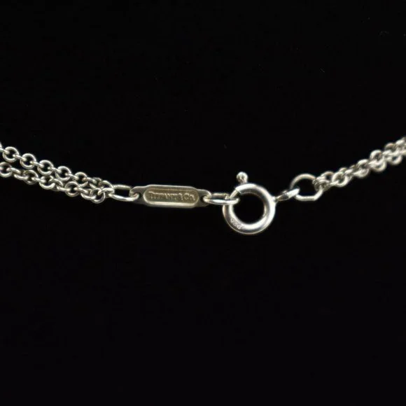 TIFFANY & CO: Sterling Silver "Infinity" Necklace - Picture 4 of 6